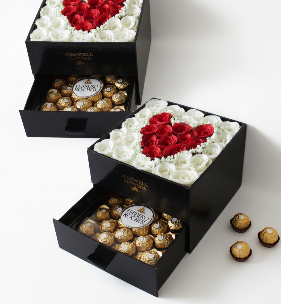 Black gift box with red heart-shaped roses and Ferrero Rocher chocolates on a white background