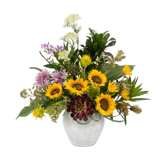 Bouquet of flowers with sunflowers and other varieties in a gray vase on a white background